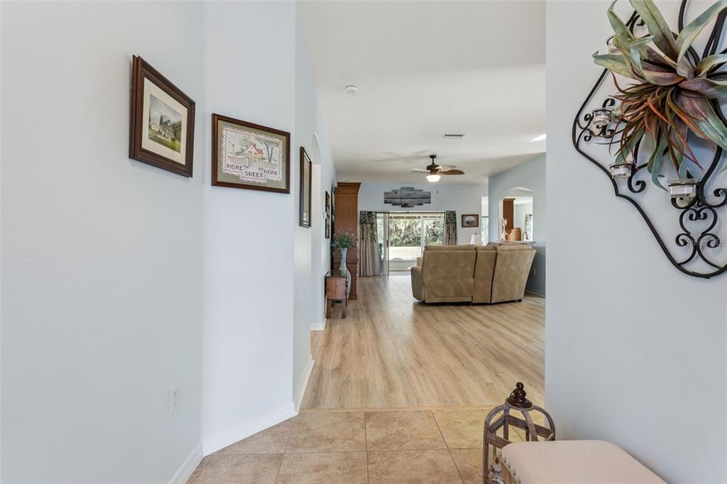 3601 Arlington Ridge Boulevard Leesburg, FL 34748 - Photo 6 of 44 a living room with furniture and a flat screen tv