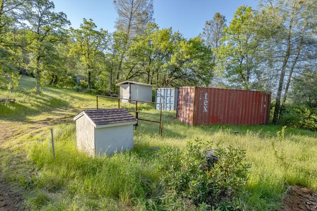 a backyard of a house with lots of green space