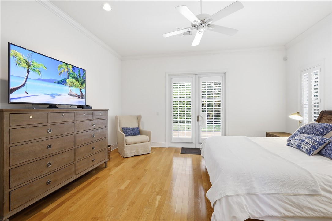 2116 Cavalla Road Vero Beach, FL 32963 - Photo 8 of 23 a bedroom with a bed and a dresser