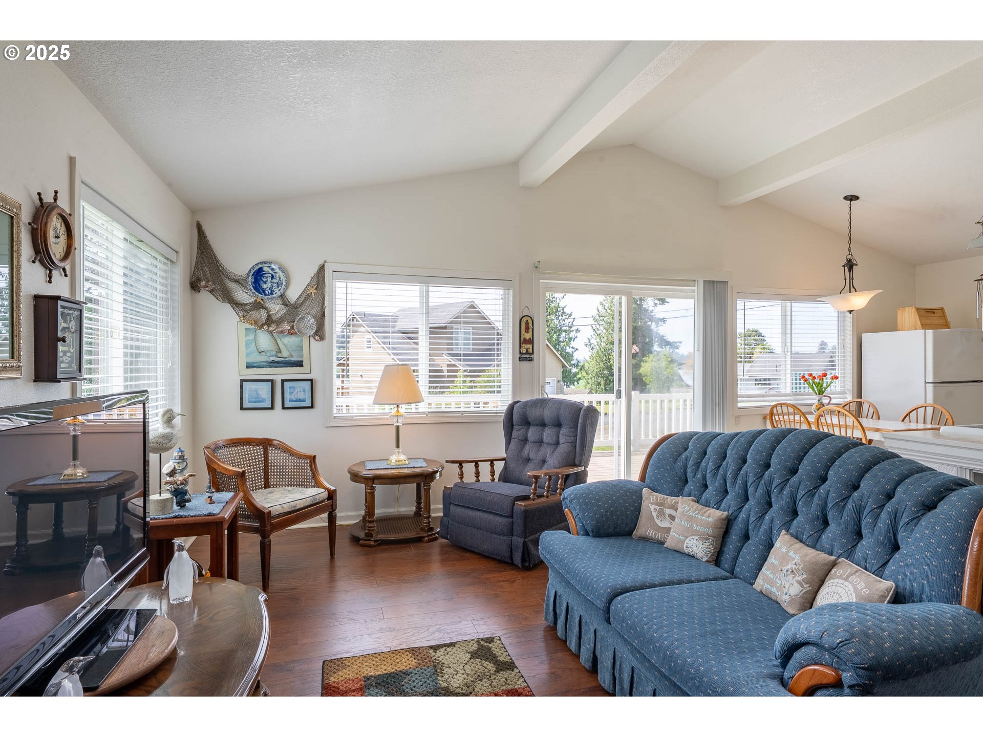 5305 Northeast 49th Street Neotsu, OR 97364 - Photo 16 of 32 a living room with furniture and a large window