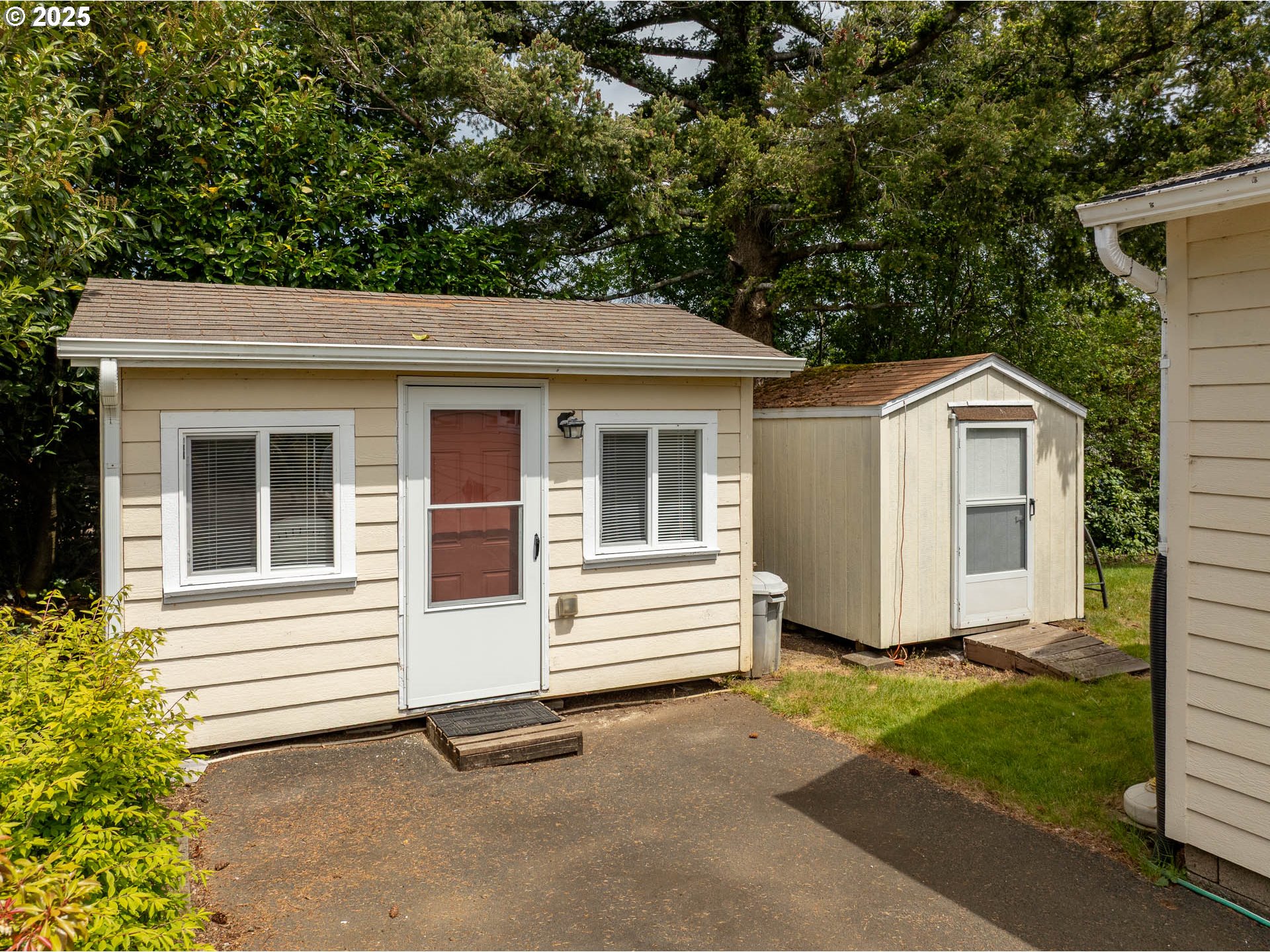 5305 Northeast 49th Street Neotsu, OR 97364 - Photo 8 of 32 a view of a house with a yard