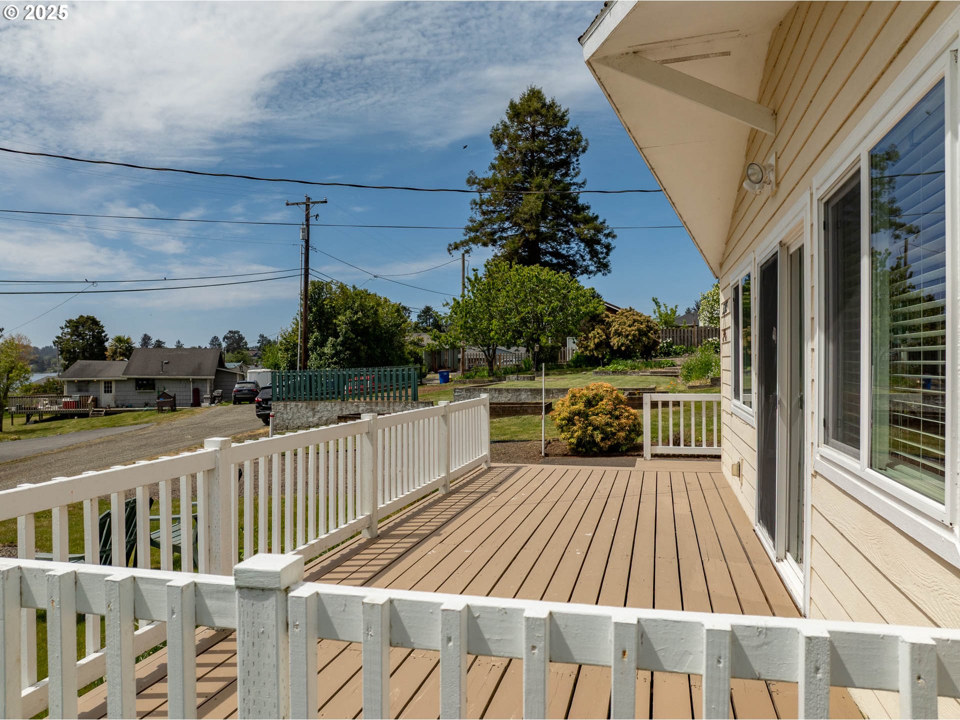 5305 Northeast 49th Street Neotsu, OR 97364 - Photo 10 of 32 a view of balcony with wooden floor