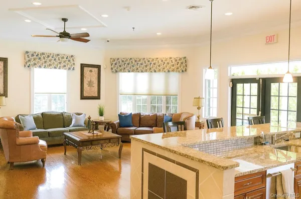 a dining room with a table and chairs