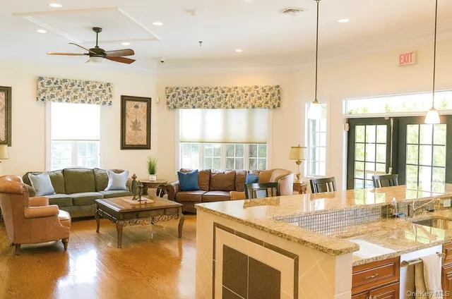 a dining room with a table and chairs