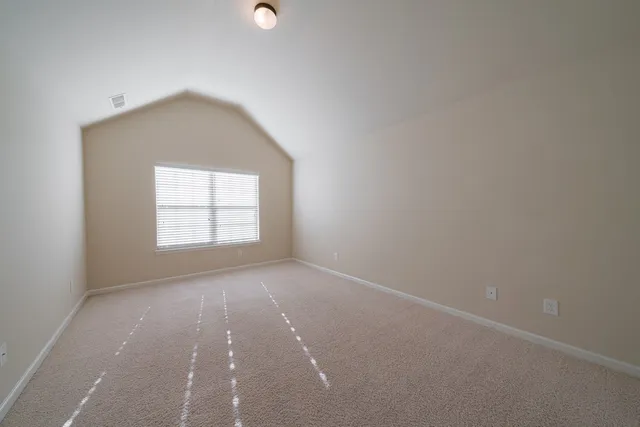a view of a hallway view with staircase