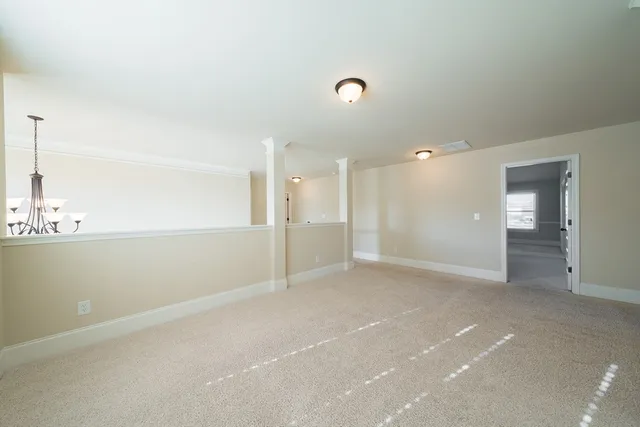 a view of a livingroom with a ceiling fan
