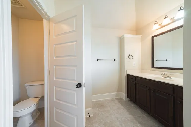 a view of empty room with windows