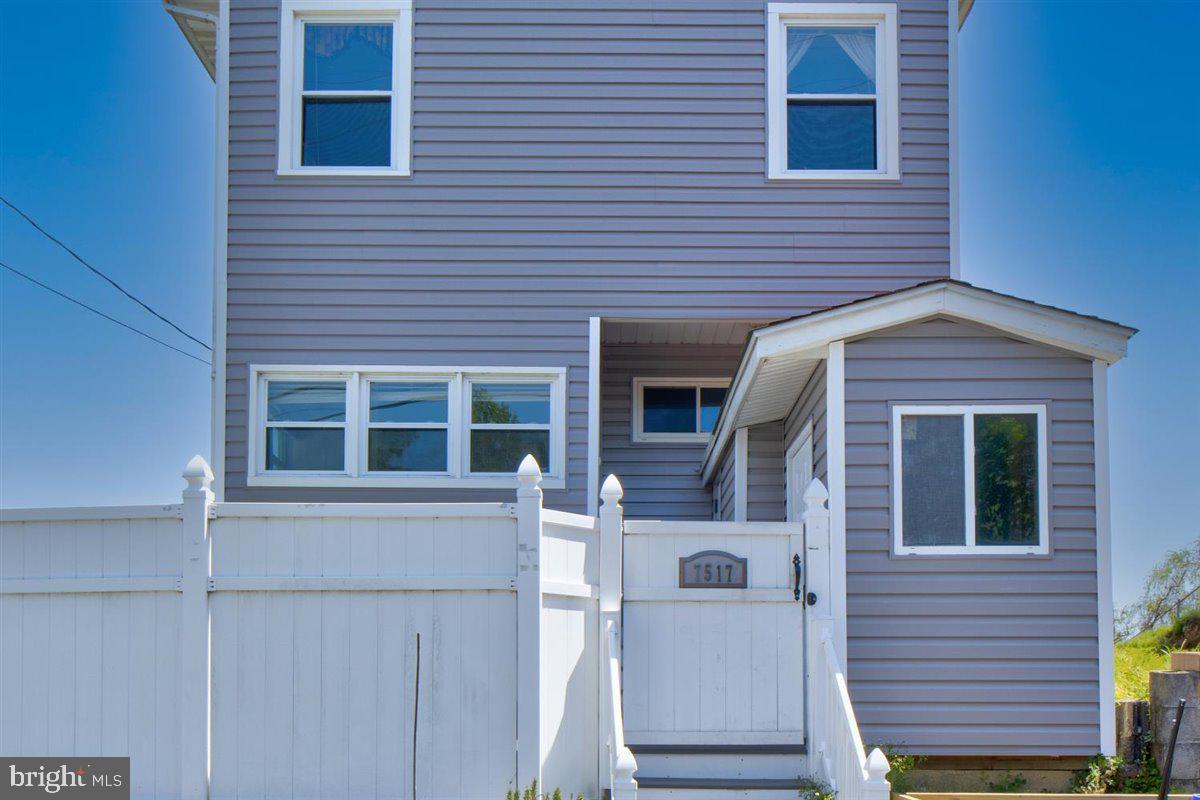 7517 B Street Chesapeake Beach, MD 20732 - Photo 23 of 78 a view of a house with a white door
