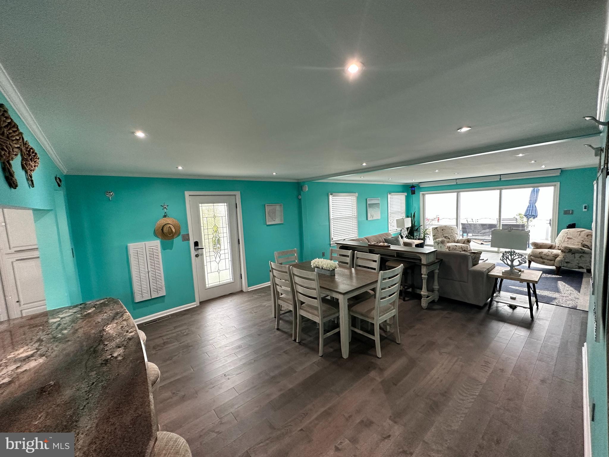 7517 B Street Chesapeake Beach, MD 20732 - Photo 41 of 78 a view of a livingroom with furniture window and wooden floor