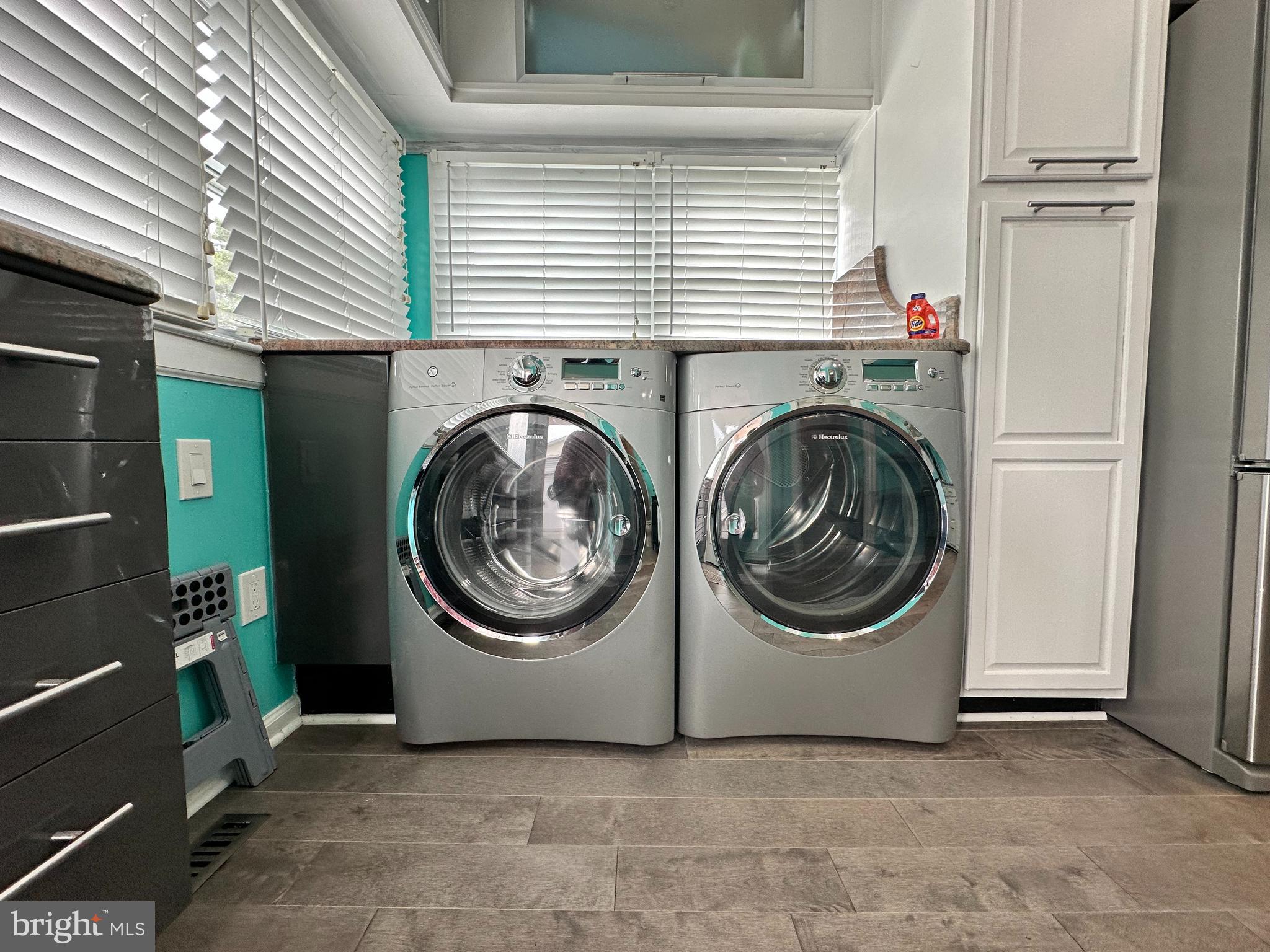 7517 B Street Chesapeake Beach, MD 20732 - Photo 52 of 78 a utility room with dryer and washer