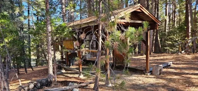 a view of a house with a tree