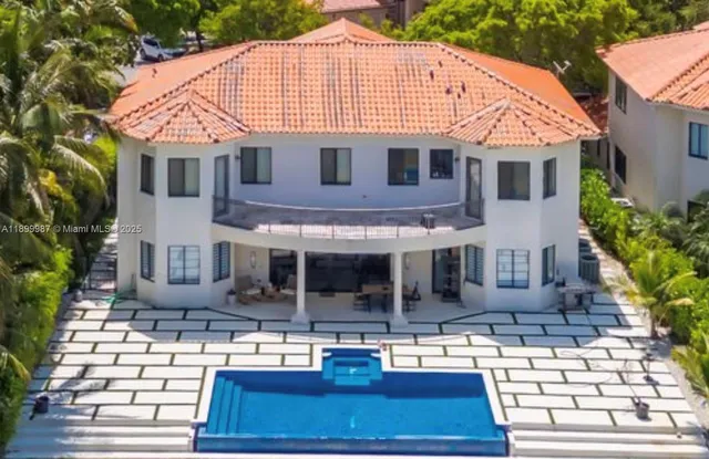 a front view of a house with yard