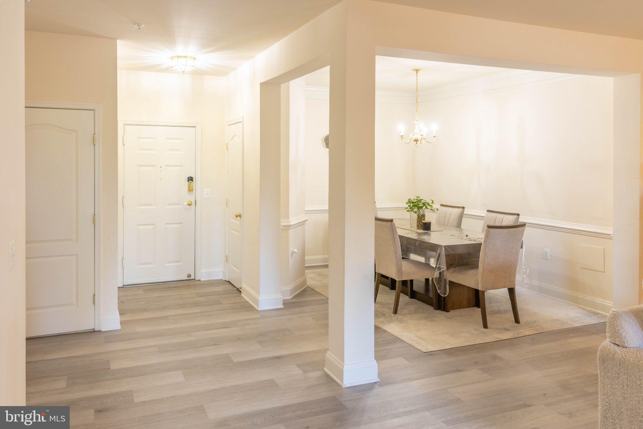 12824 Clarksburg Square Road, Unit 105 Clarksburg, MD 20871 - Photo 45 of 96 Inviting entryway with dining space.