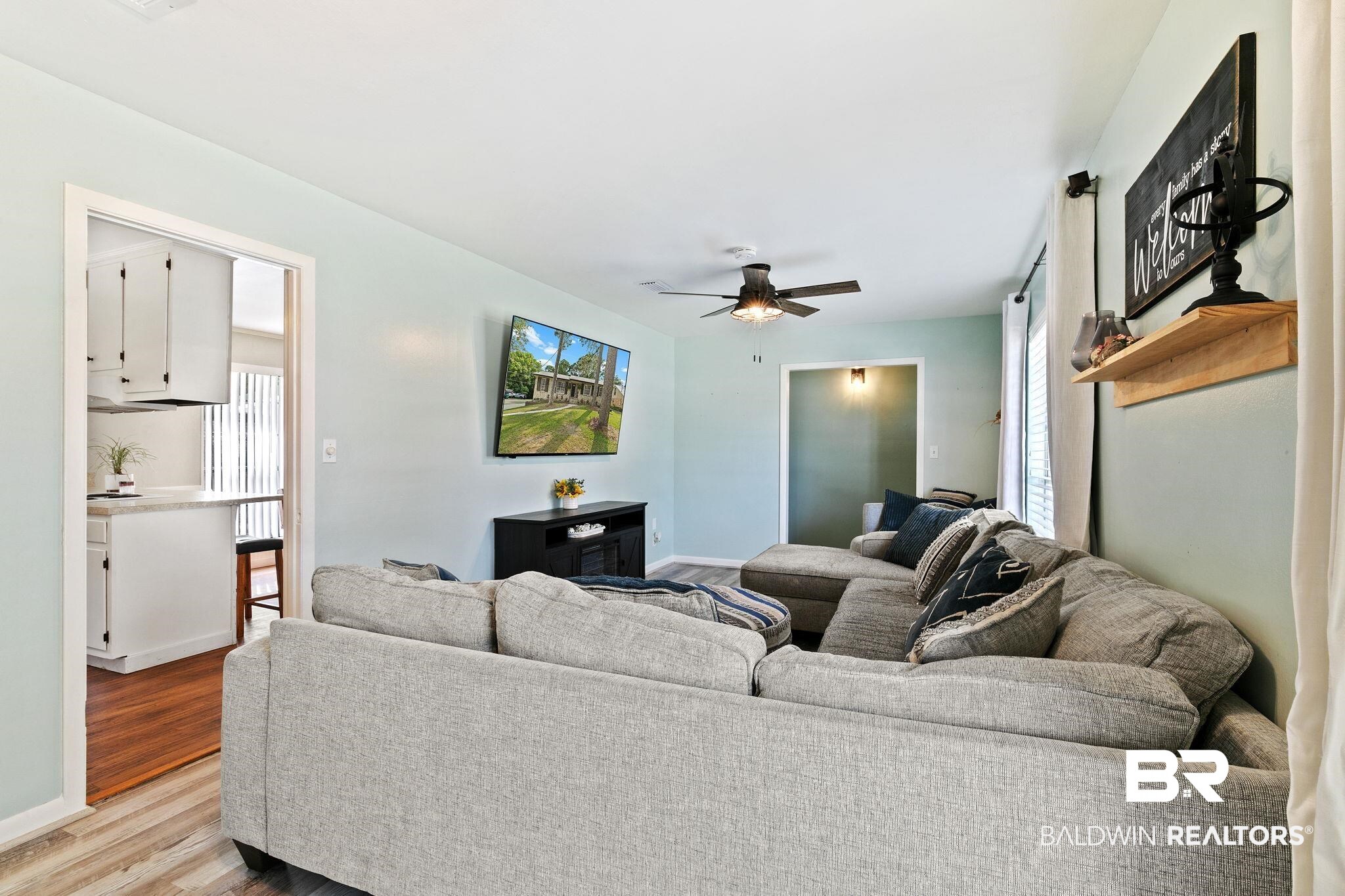 14 Lee Circle Daphne, AL 36527 - Photo 22 of 83 Living room with light hardwood / wood-style floors and ceiling fan