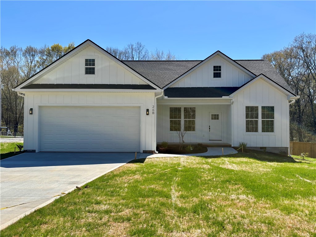 26 B Fisher Jenkins Road Anderson, SC 29625 - Photo 1 of 24 This newly constructed residence showcases a crisp, modern farmhouse aesthetic with inviting curb appeal.