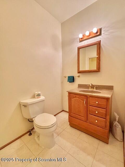400 Fairview Road Clarks Green, PA 18411 - Photo 12 of 32 a bathroom with a toilet a sink and a mirror