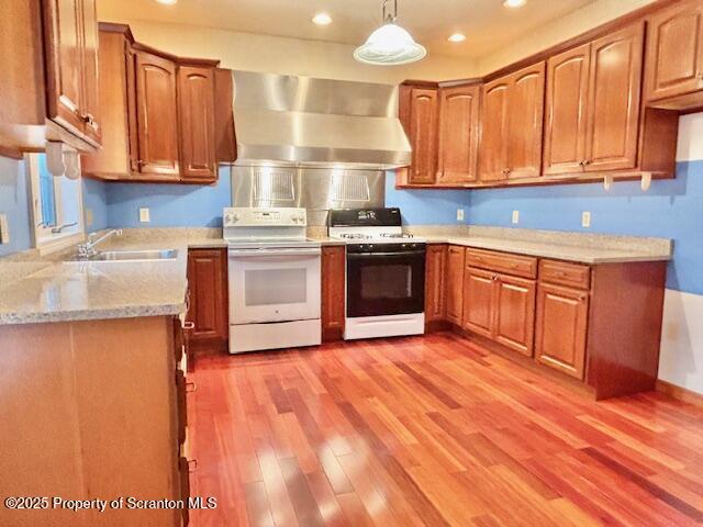 400 Fairview Road Clarks Green, PA 18411 - Photo 2 of 32 a kitchen with stainless steel appliances granite countertop a sink a stove a refrigerator cabinets and wooden floor