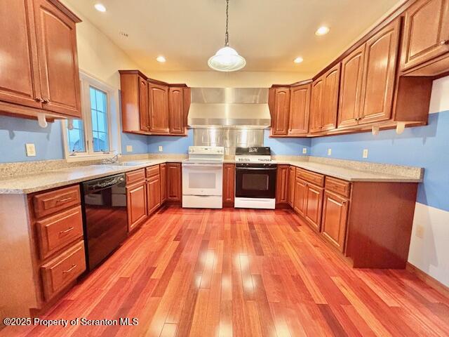400 Fairview Road Clarks Green, PA 18411 - Photo 3 of 32 a large kitchen with stainless steel appliances granite countertop a stove a sink dishwasher and a microwave oven with cabinets