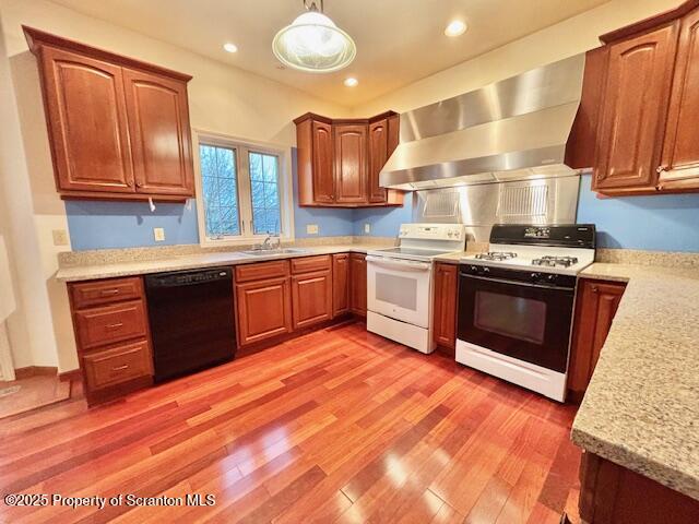 400 Fairview Road Clarks Green, PA 18411 - Photo 4 of 32 a kitchen with stainless steel appliances granite countertop a stove a sink dishwasher and a refrigerator