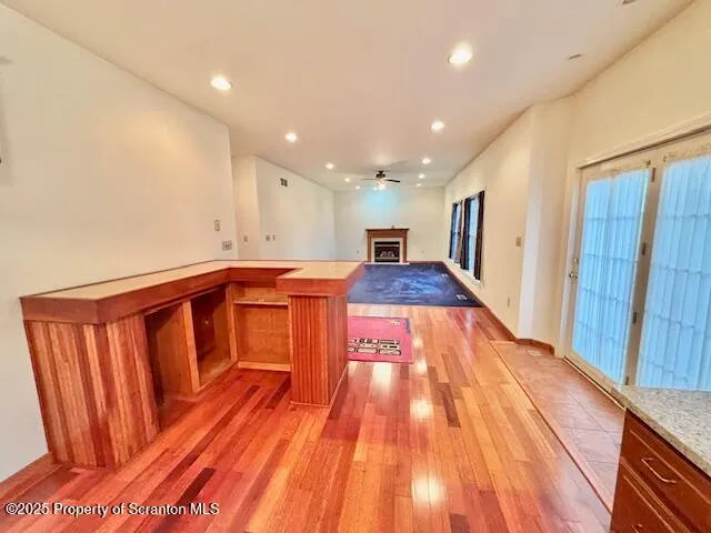 a very nice looking room with wooden floor
