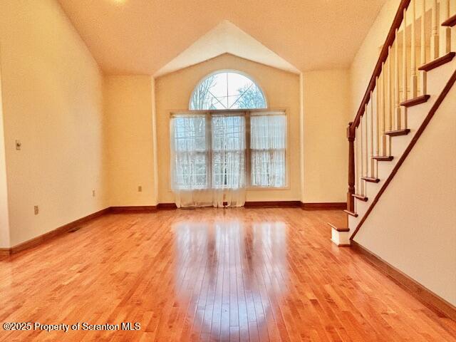 400 Fairview Road Clarks Green, PA 18411 - Photo 9 of 32 an empty room with wooden floor and windows