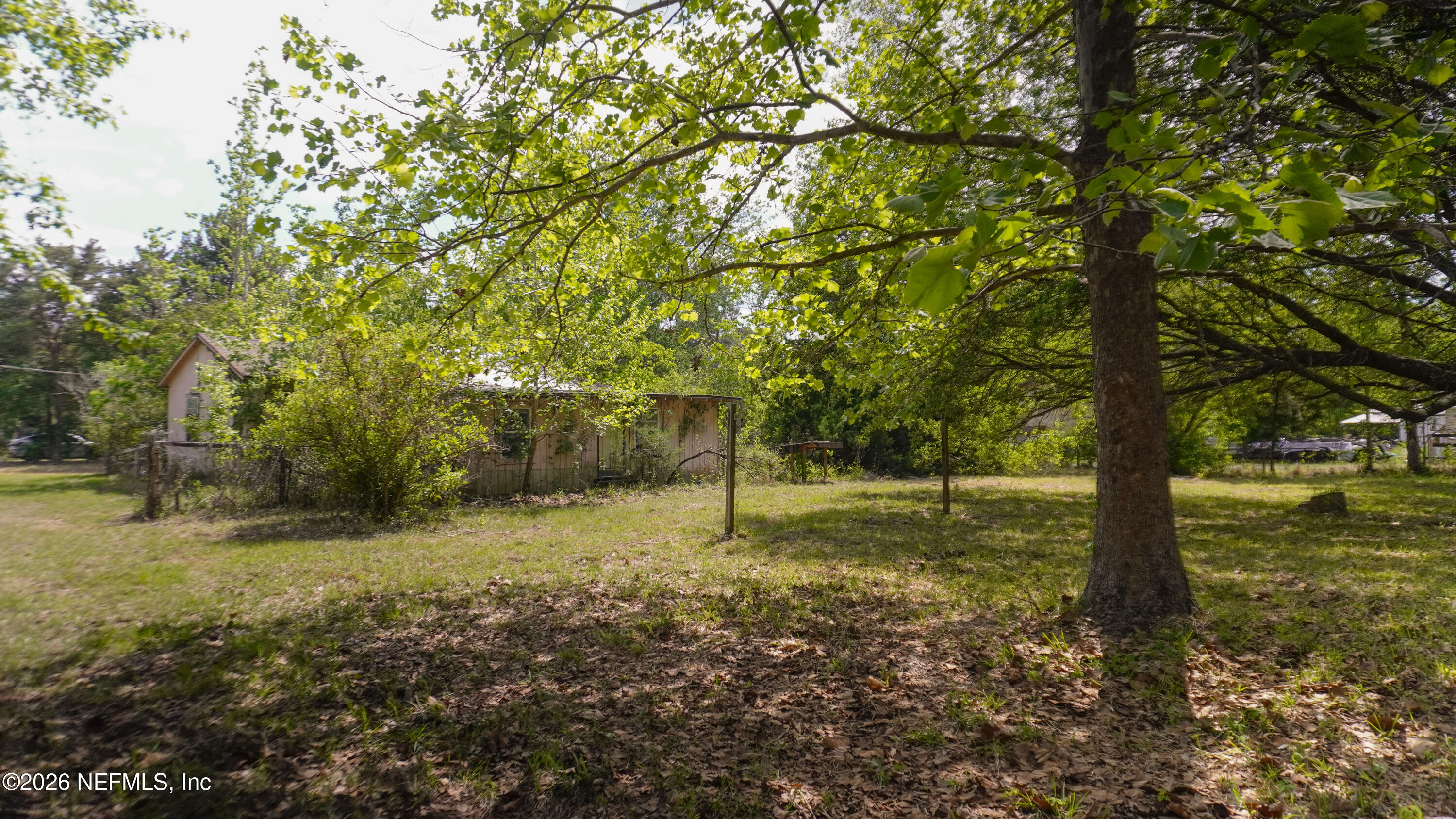 36507 Pratt Siding Road Callahan, FL 32011 - Photo 2 of 14 a backyard of a house with lots of green space