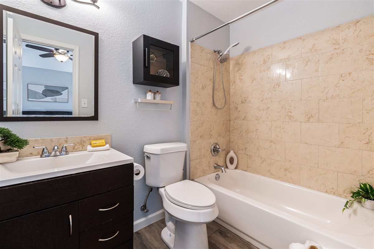 2147 Jasmine Path Round Rock, TX 78664 - Photo 21 of 36 Direct access to the en-suite bath adds an extra layer of privacy and convenience.