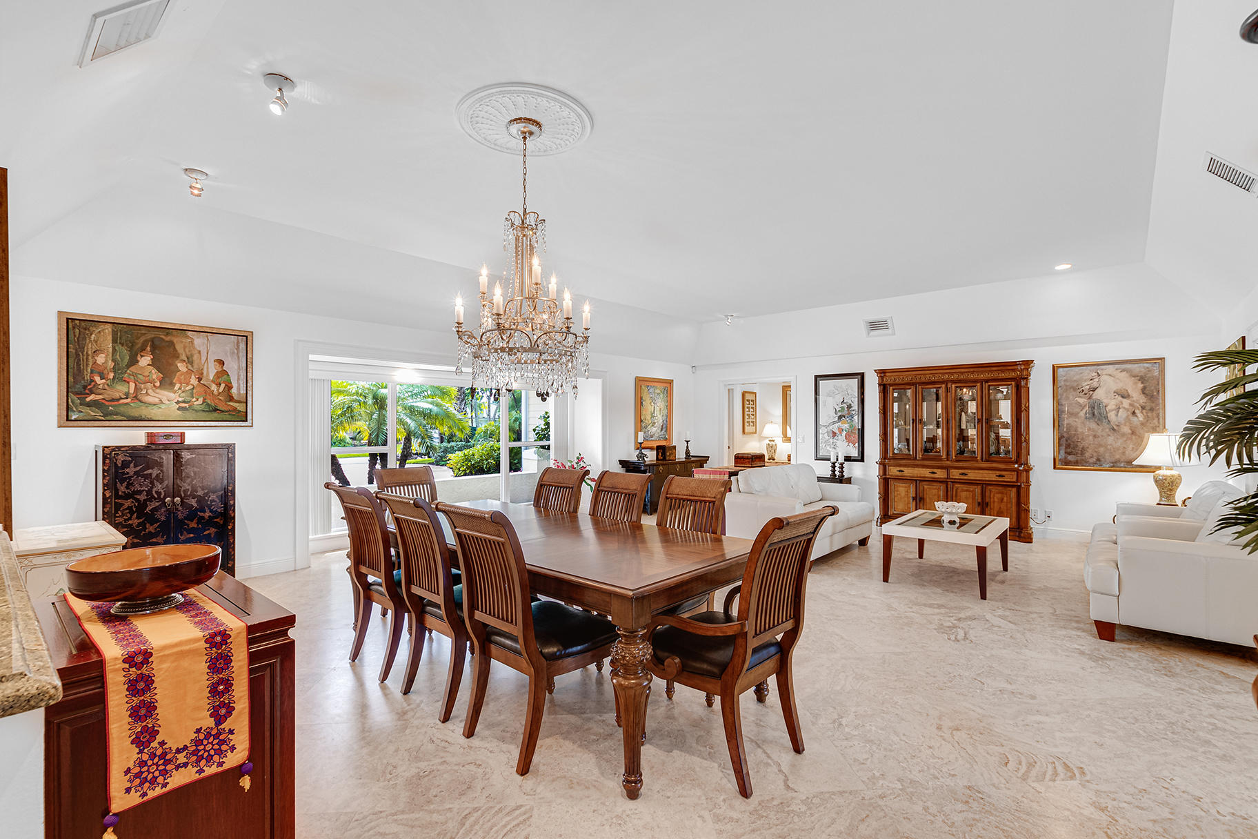 75 River Drive Tequesta, FL 33469 - Photo 21 of 42 a view of a dining room with furniture window and outside view