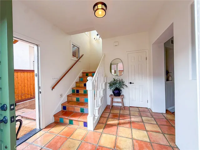 a patio with table and chairs