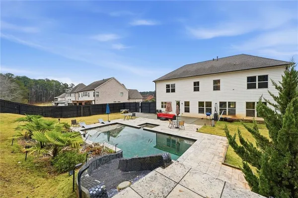 a picture of a bathroom with a shower