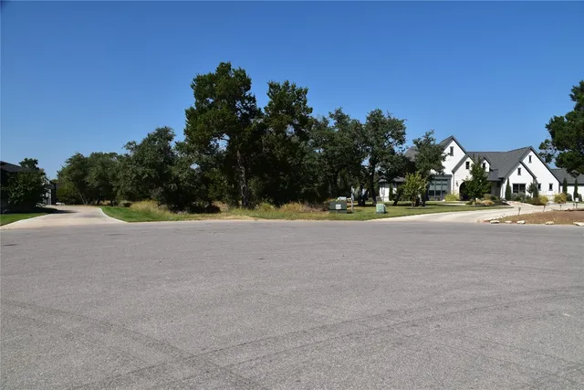 a view of road and trees