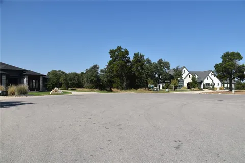 a view of a street with houses