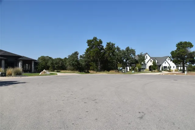 a view of a street with houses