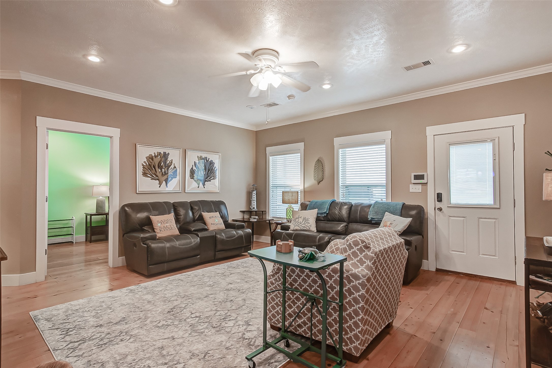 935 Westview Crystal Beach, TX 77650 - Photo 18 of 38 a living room with furniture and a large window