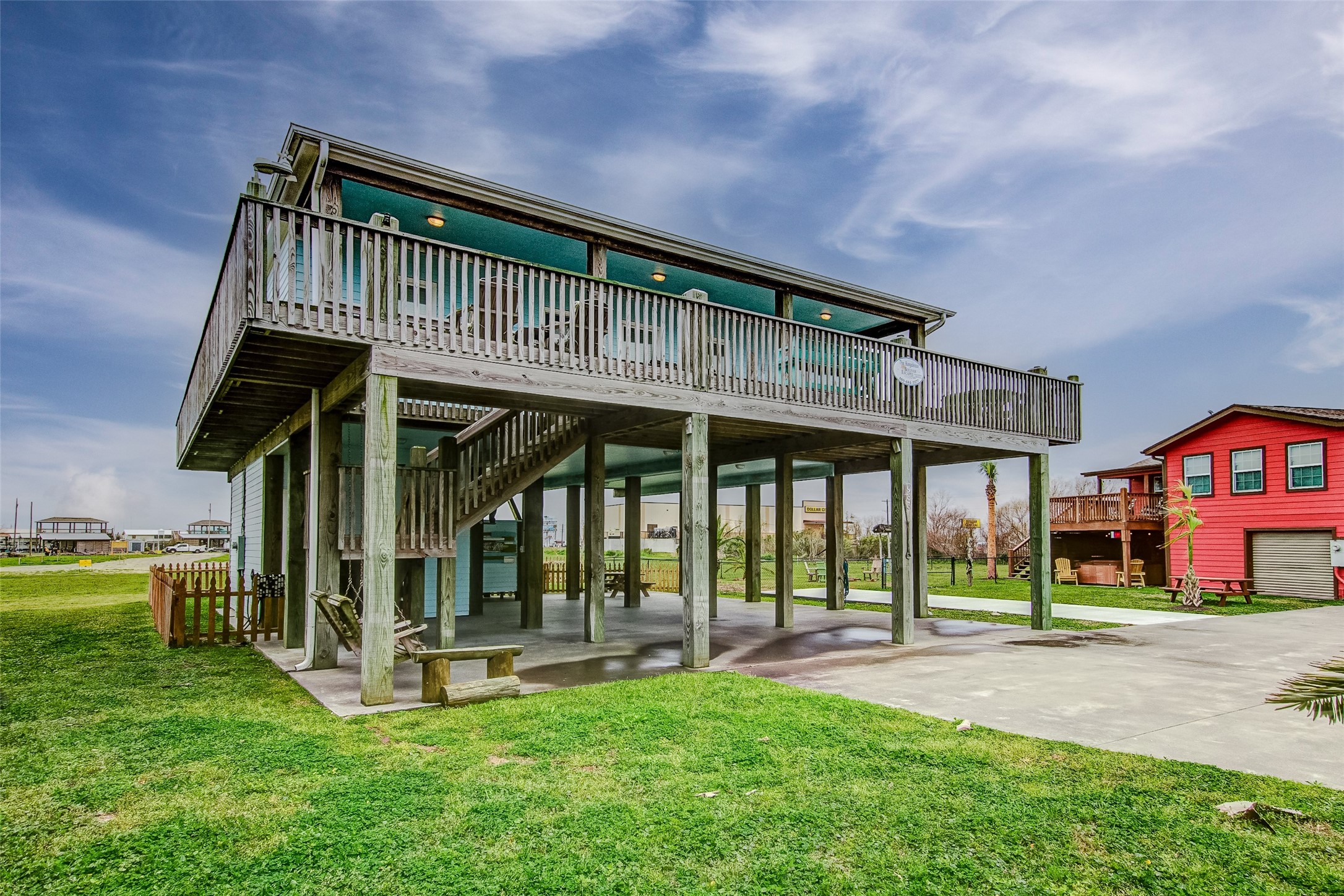 935 Westview Crystal Beach, TX 77650 - Photo 2 of 38 a view of a house with a yard balcony and sitting area