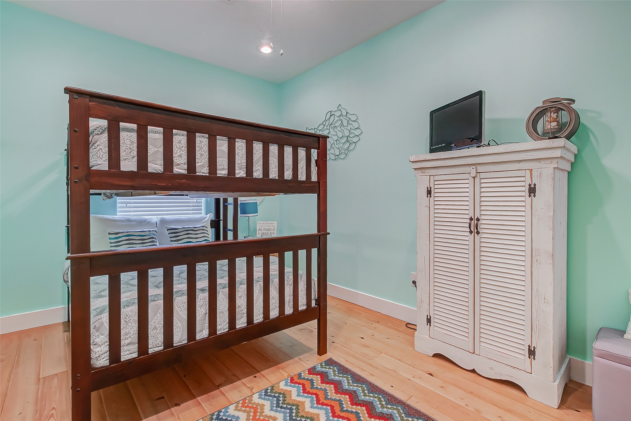 935 Westview Crystal Beach, TX 77650 - Photo 28 of 38 a view of hallway with wooden floor
