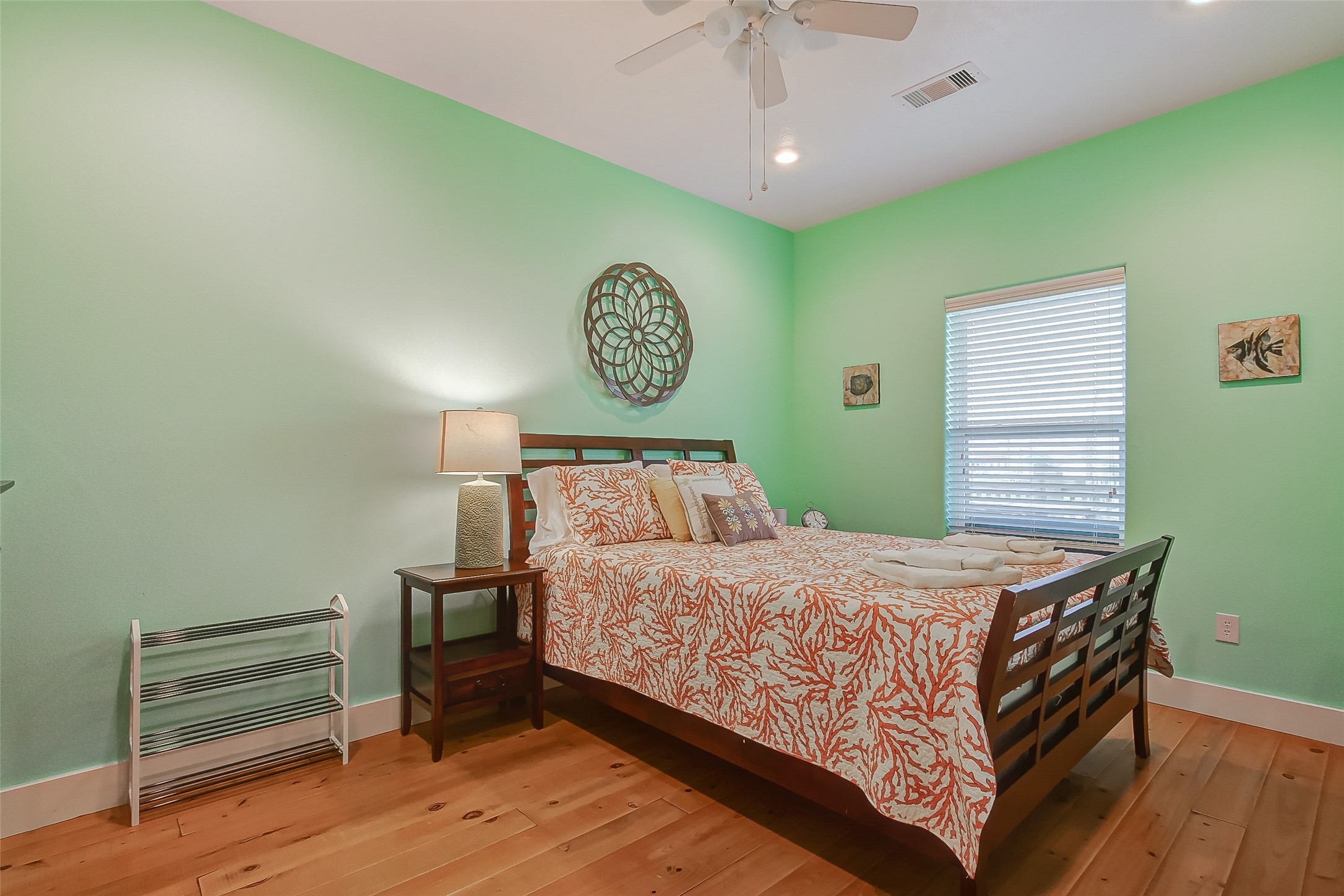 935 Westview Crystal Beach, TX 77650 - Photo 30 of 38 a bedroom with a bed and a table