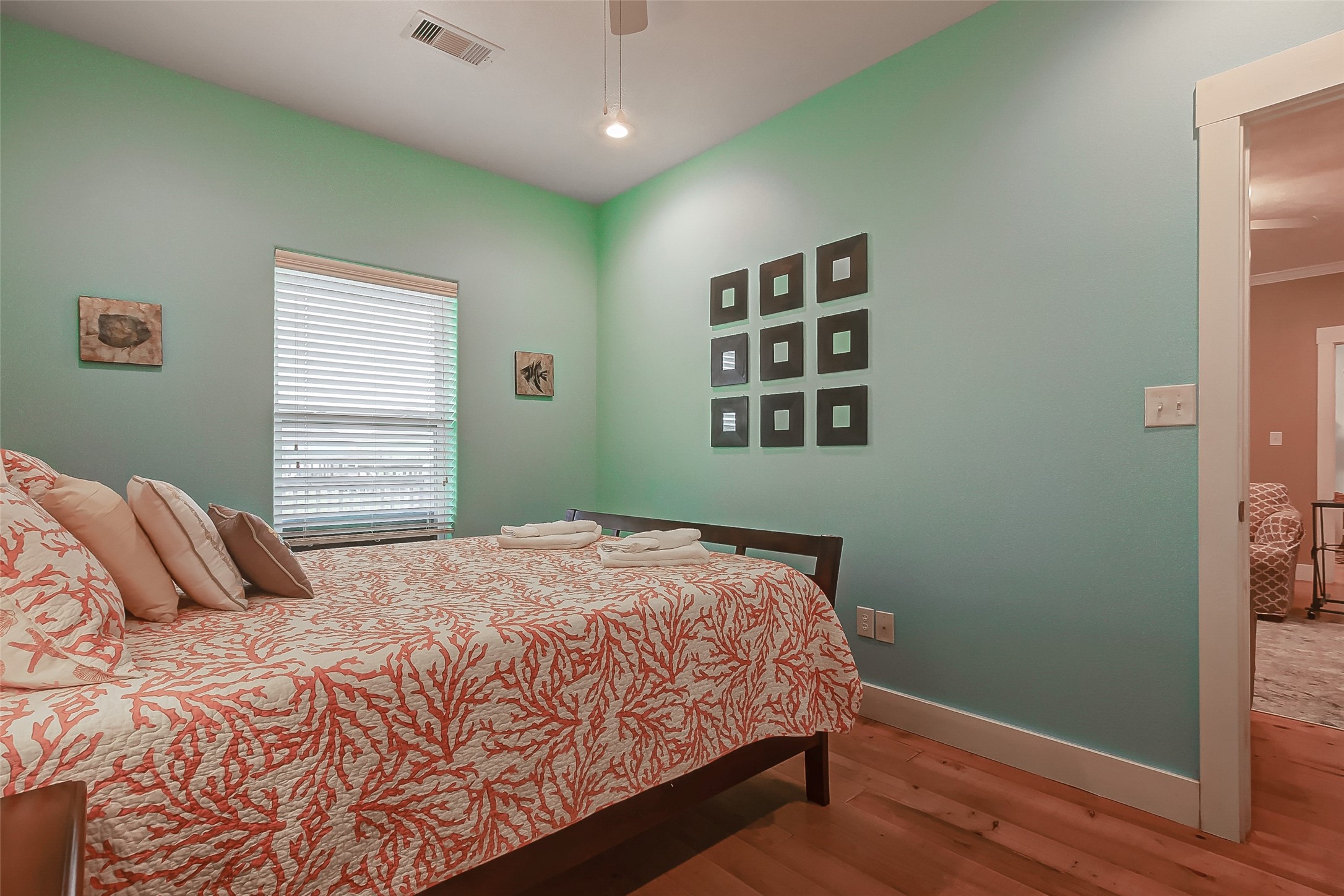 935 Westview Crystal Beach, TX 77650 - Photo 31 of 38 a bedroom with a bed and a window