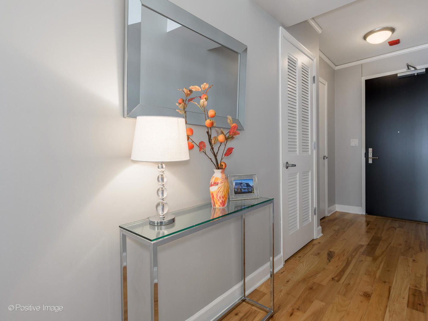 Undisclosed Address Chicago, IL 60601 - Photo 12 of 25 a bedroom with a bed and a dresser