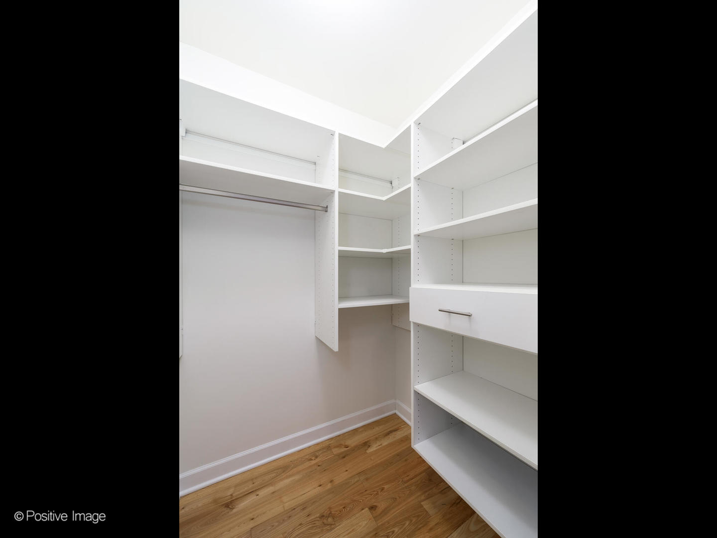 Undisclosed Address Chicago, IL 60601 - Photo 14 of 25 a view of a room with shelf on the wall