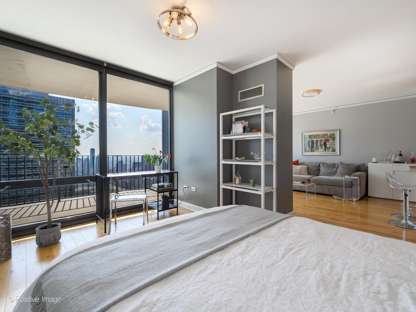 Undisclosed Address Chicago, IL 60601 - Photo 9 of 25 a bedroom with furniture and large window