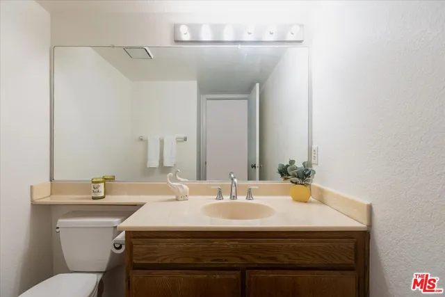 a bathroom with a sink and a toilet