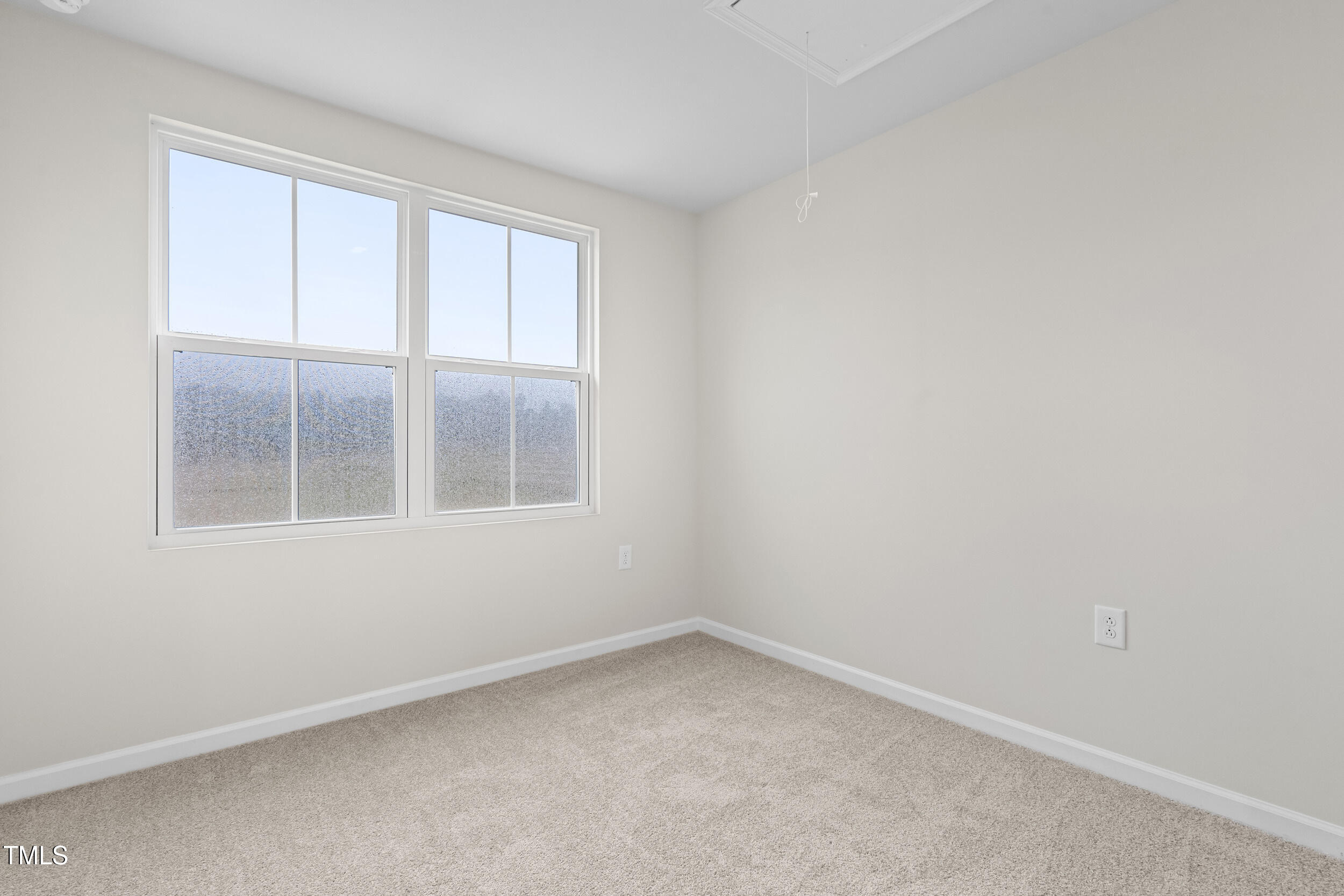 161 Sunny Acrs Road Raleigh, NC 27603 - Photo 21 of 27 an empty room with a window