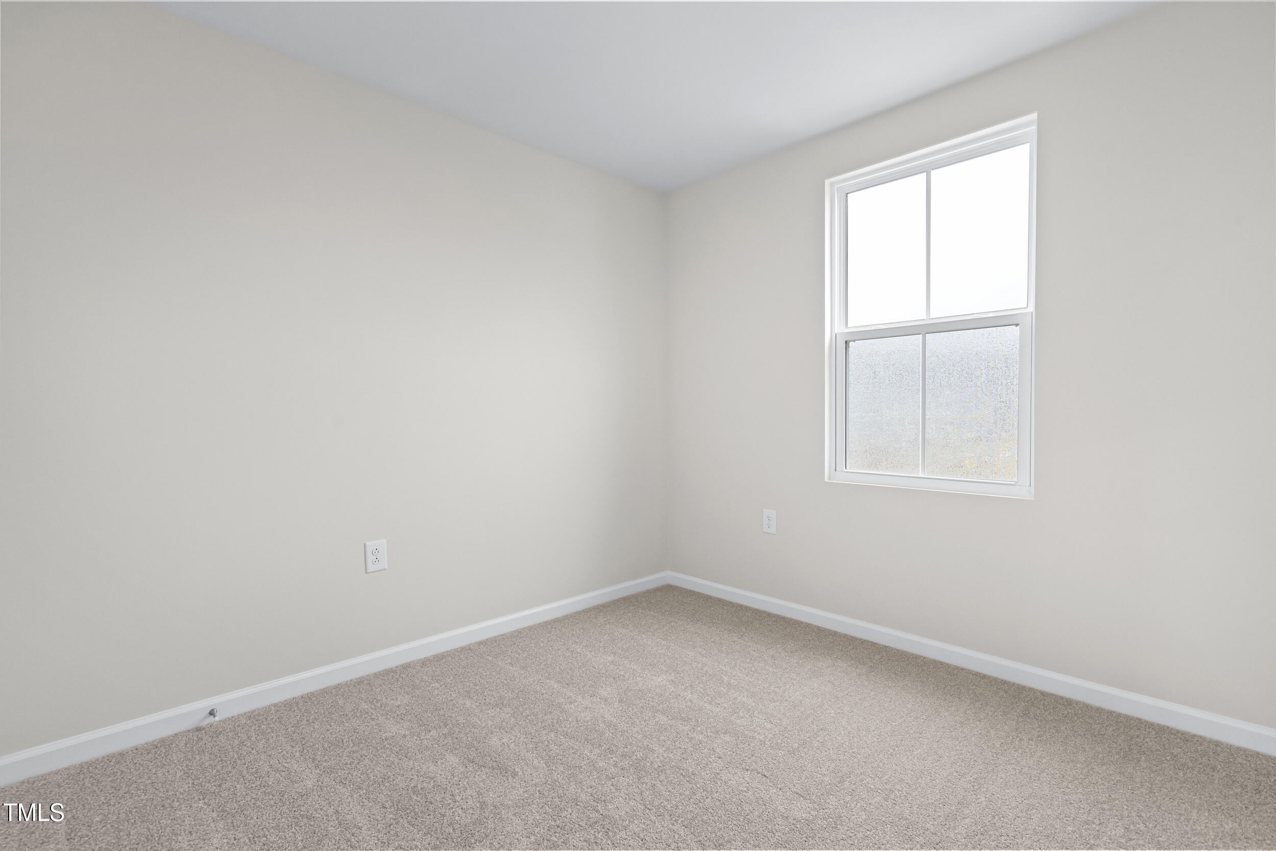 161 Sunny Acrs Road Raleigh, NC 27603 - Photo 22 of 27 an empty room with a window
