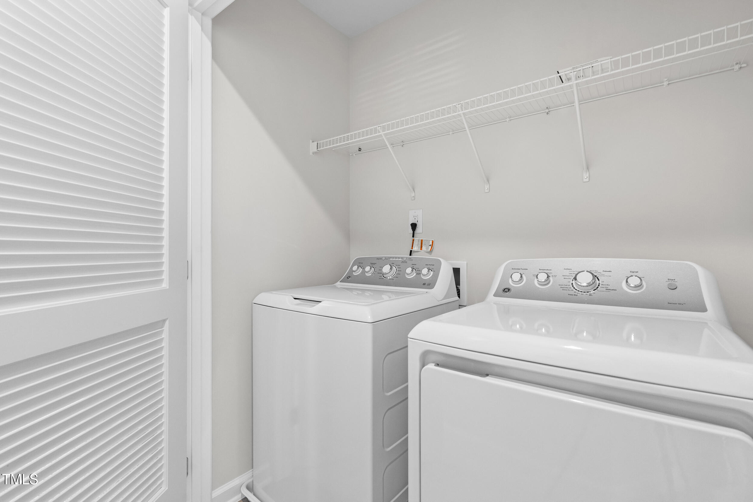 161 Sunny Acrs Road Raleigh, NC 27603 - Photo 23 of 27 a utility room with dryer and washer