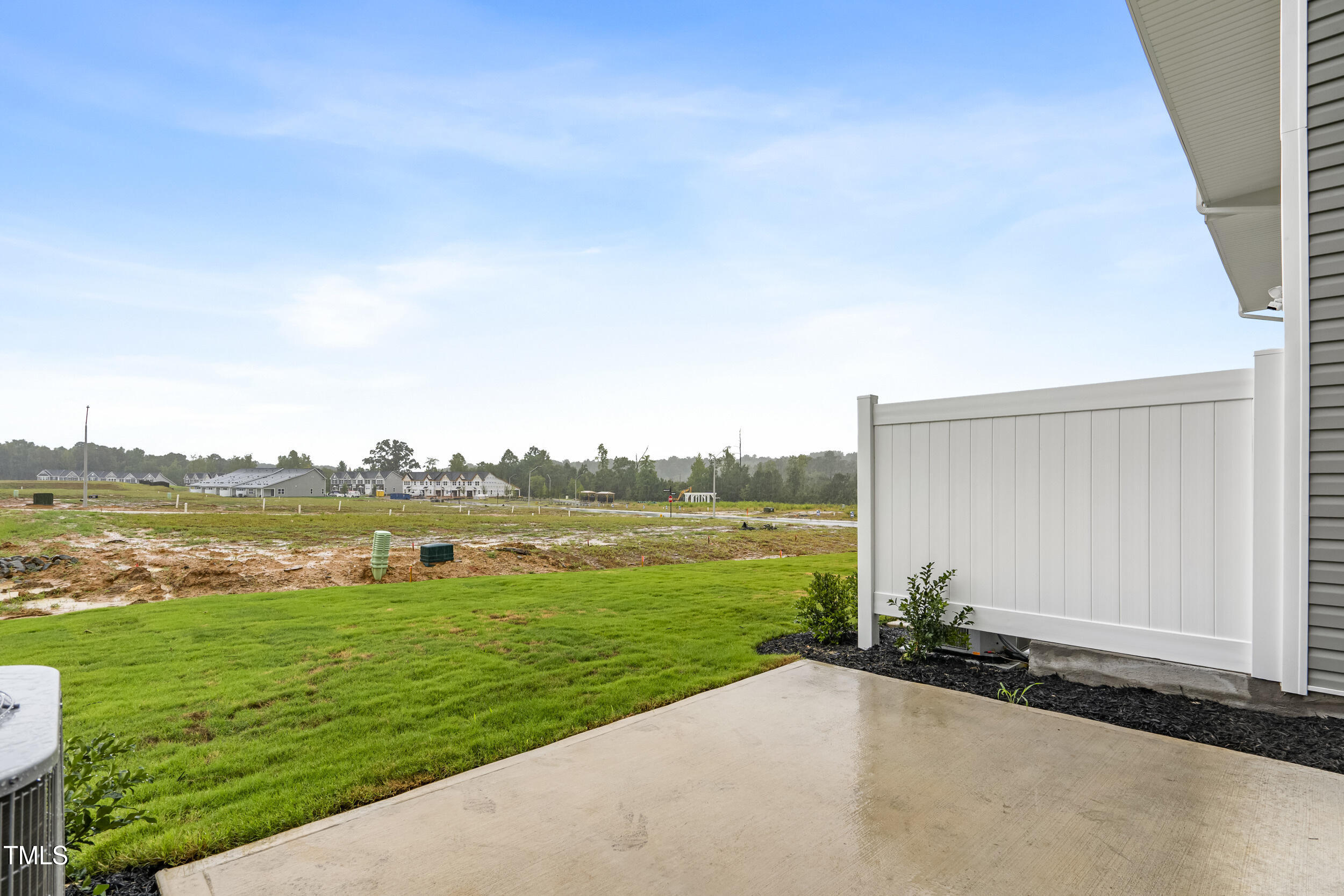 161 Sunny Acrs Road Raleigh, NC 27603 - Photo 25 of 27 a view of a terrace with a garden