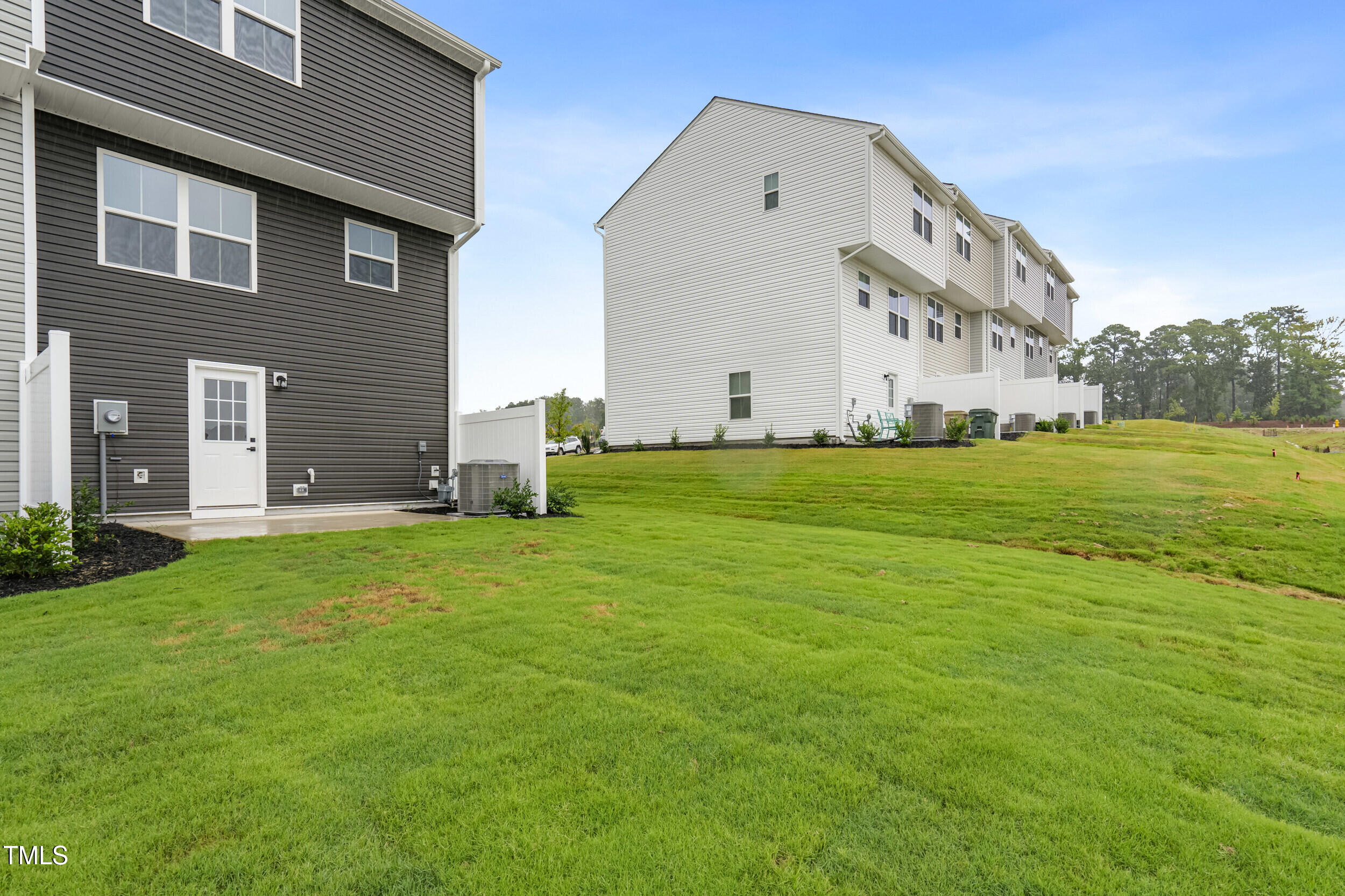 161 Sunny Acrs Road Raleigh, NC 27603 - Photo 27 of 27 a view of a house with a big yard