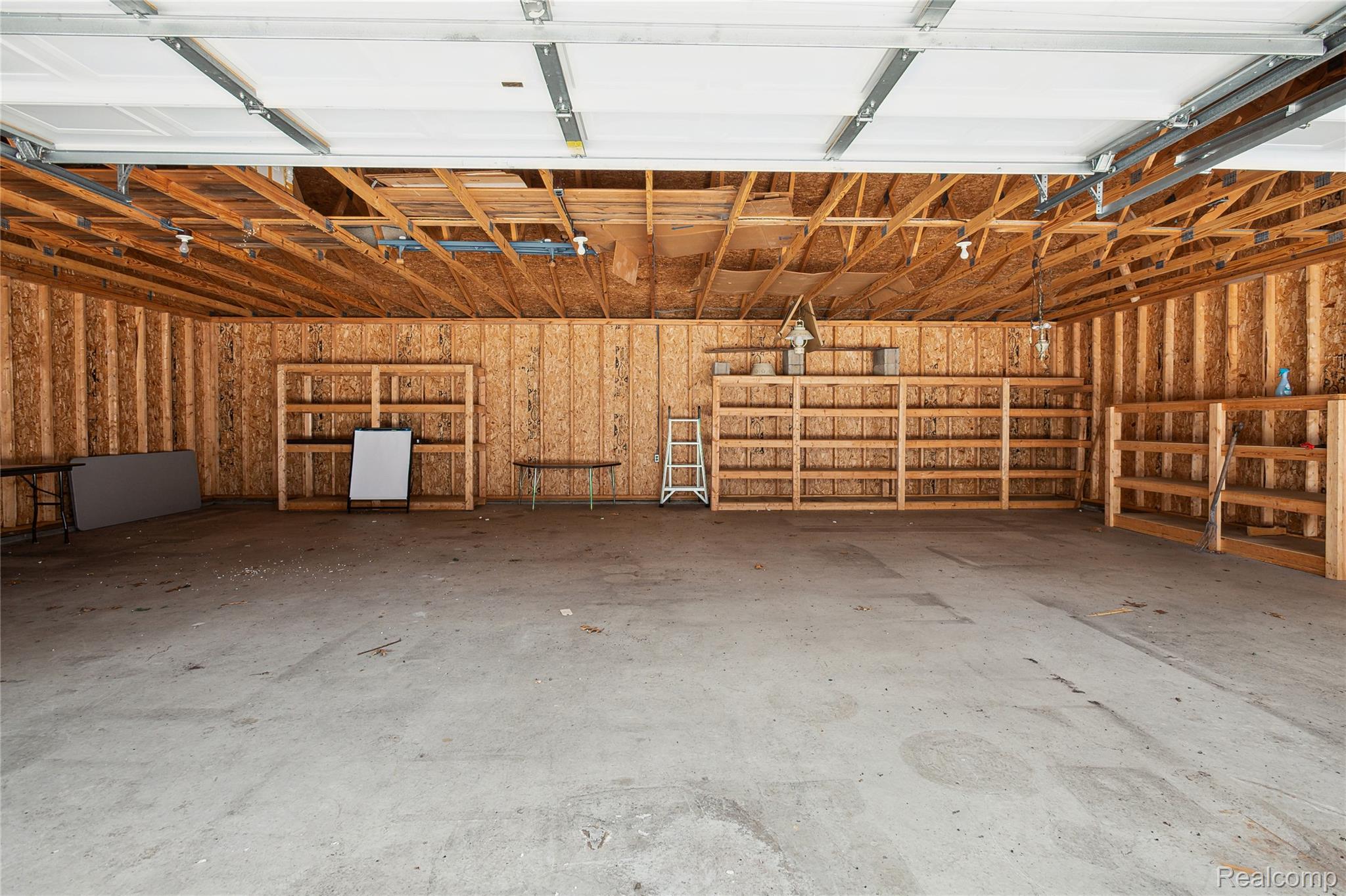 4300 West Bacon Road Hillsdale, MI 49242 - Photo 38 of 49 Inside the 3 car Garage