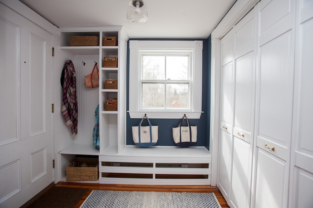 41 Forest Street Wellesley, MA 02481 - Photo 11 of 23 a view of walk in closet with clothes and shoes
