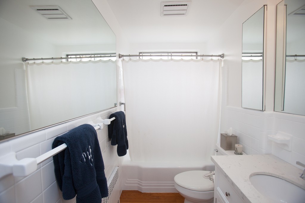 41 Forest Street Wellesley, MA 02481 - Photo 18 of 23 a bathroom with a toilet and a shower
